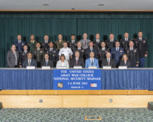 A group of people posing for a picture at The United States Army War College National Security Seminar